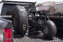 DV8 Offroad Truck Bed Universal Tire Carrier & Accessory Mount